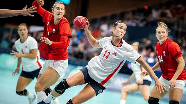 Norway's pivot #13 Kari Brattset Dale (2ndR) tries to shoot past Denmark's pivot #34 Rikke Iversen (R) during the Women's Preliminary Round Group A handball match between Denmark and Norway of the Paris 2024 Olympic Games, at the Paris South Arena in Paris, on July 28, 2024. Denmark's Rikke Iversen, Line Haugsted and Norway's Kari Brattset Dale (Photo by Mads Claus Rasmussen / Ritzau Scanpix / AFP) / Denmark OUT